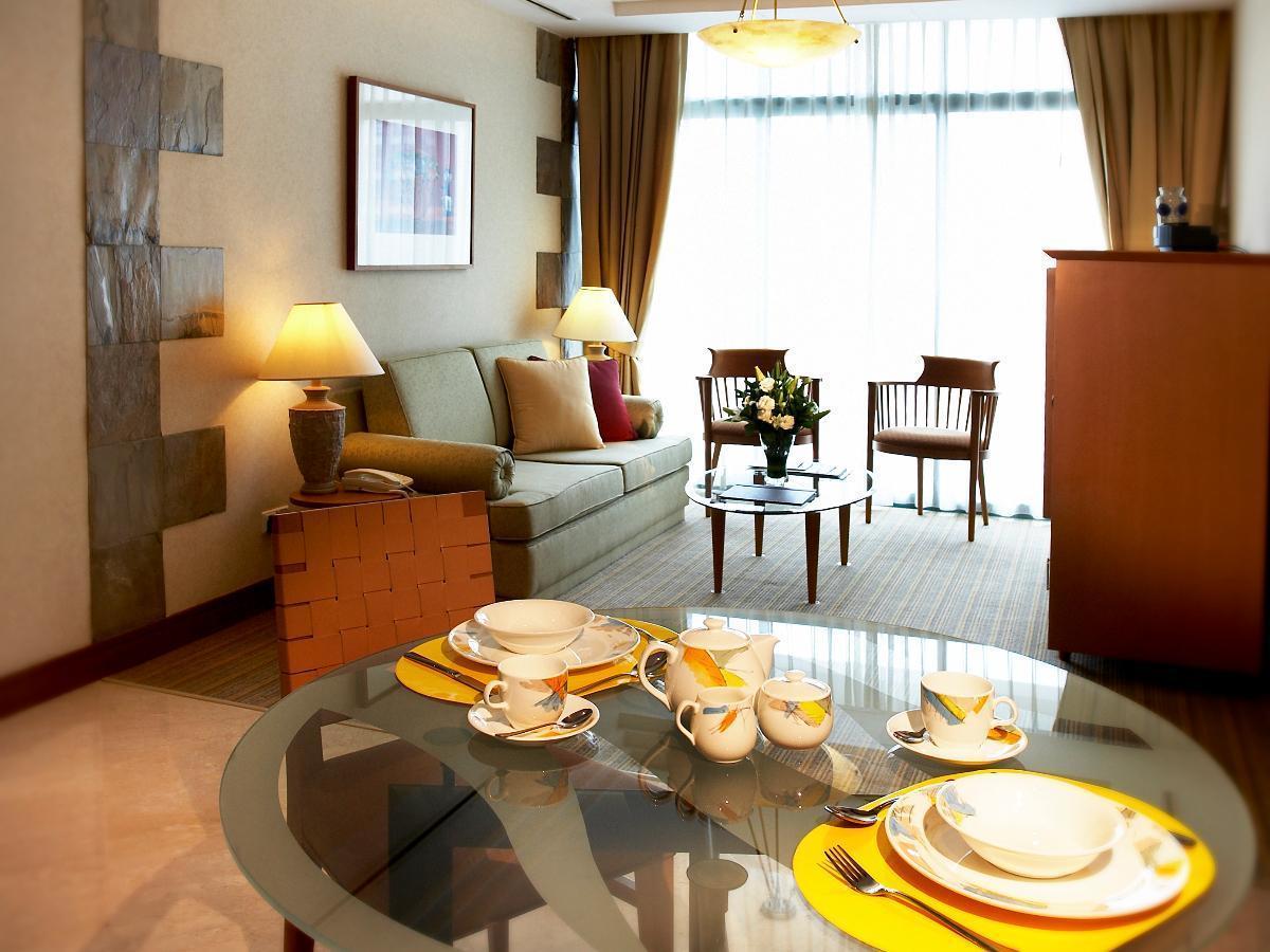 Fraser Place Robertson Walk Singapour Extérieur photo A typical living room in a serviced apartment